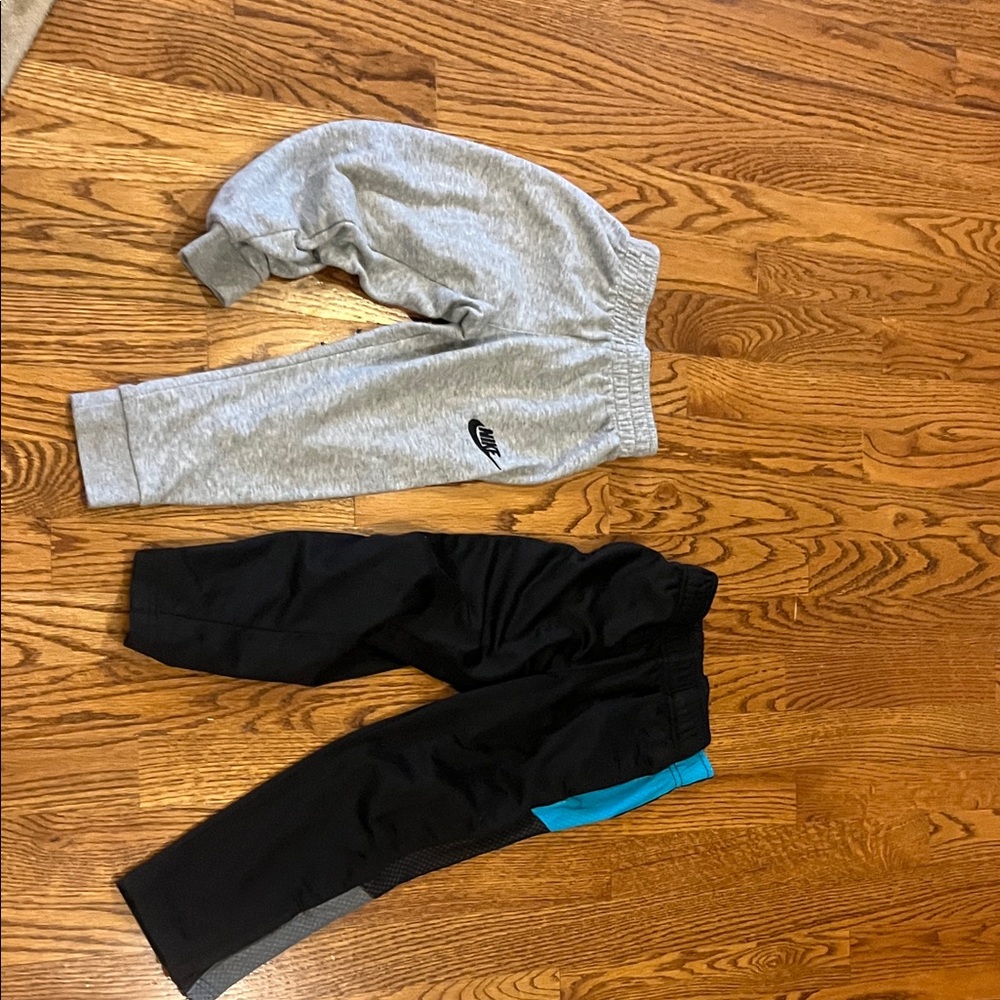 Nike Kids Grey and Black Joggers with Blue Accent (no name)
